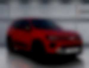 Dacia Spring Extreme 65, červená brick